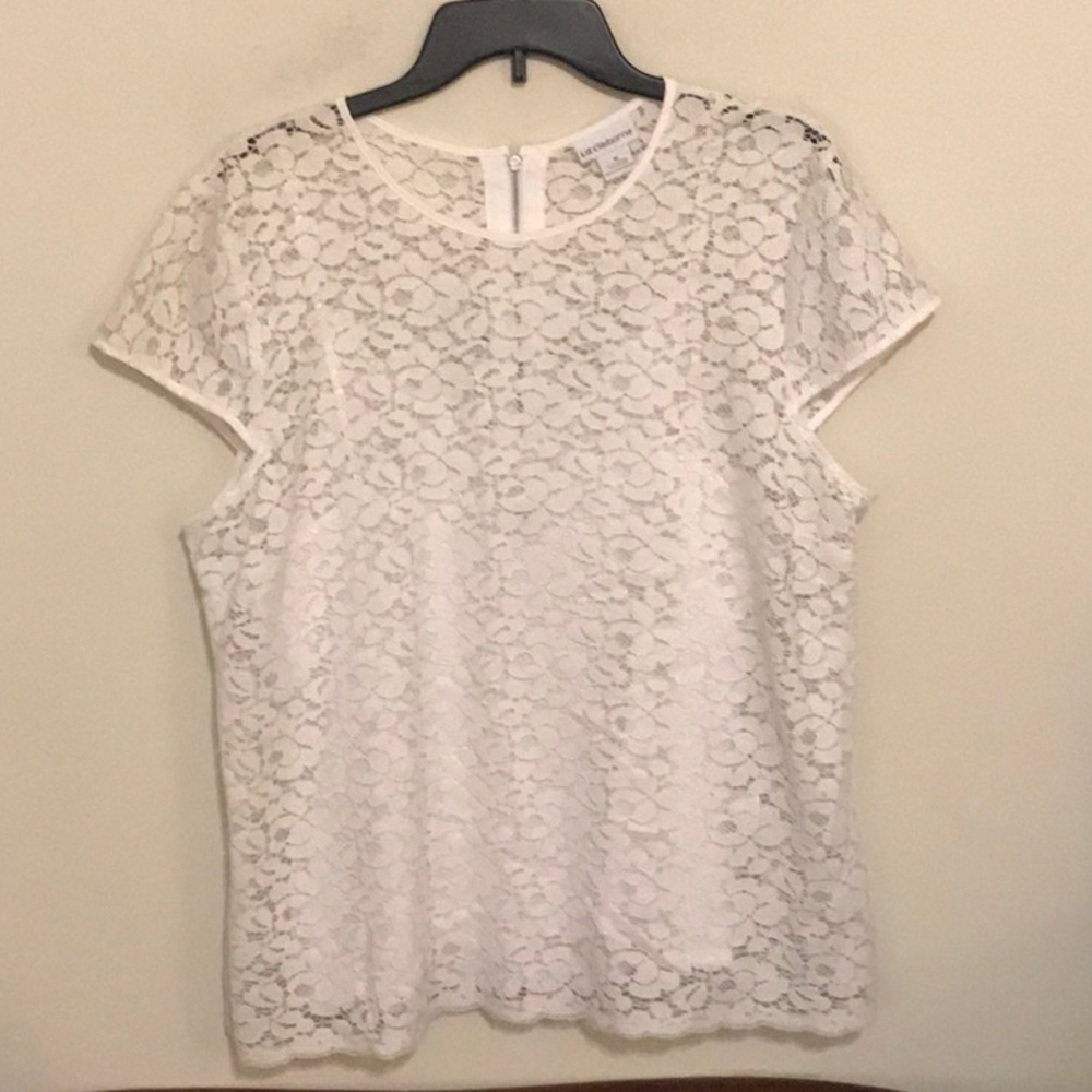 Pretty in lace.  White lace top with its own cami.